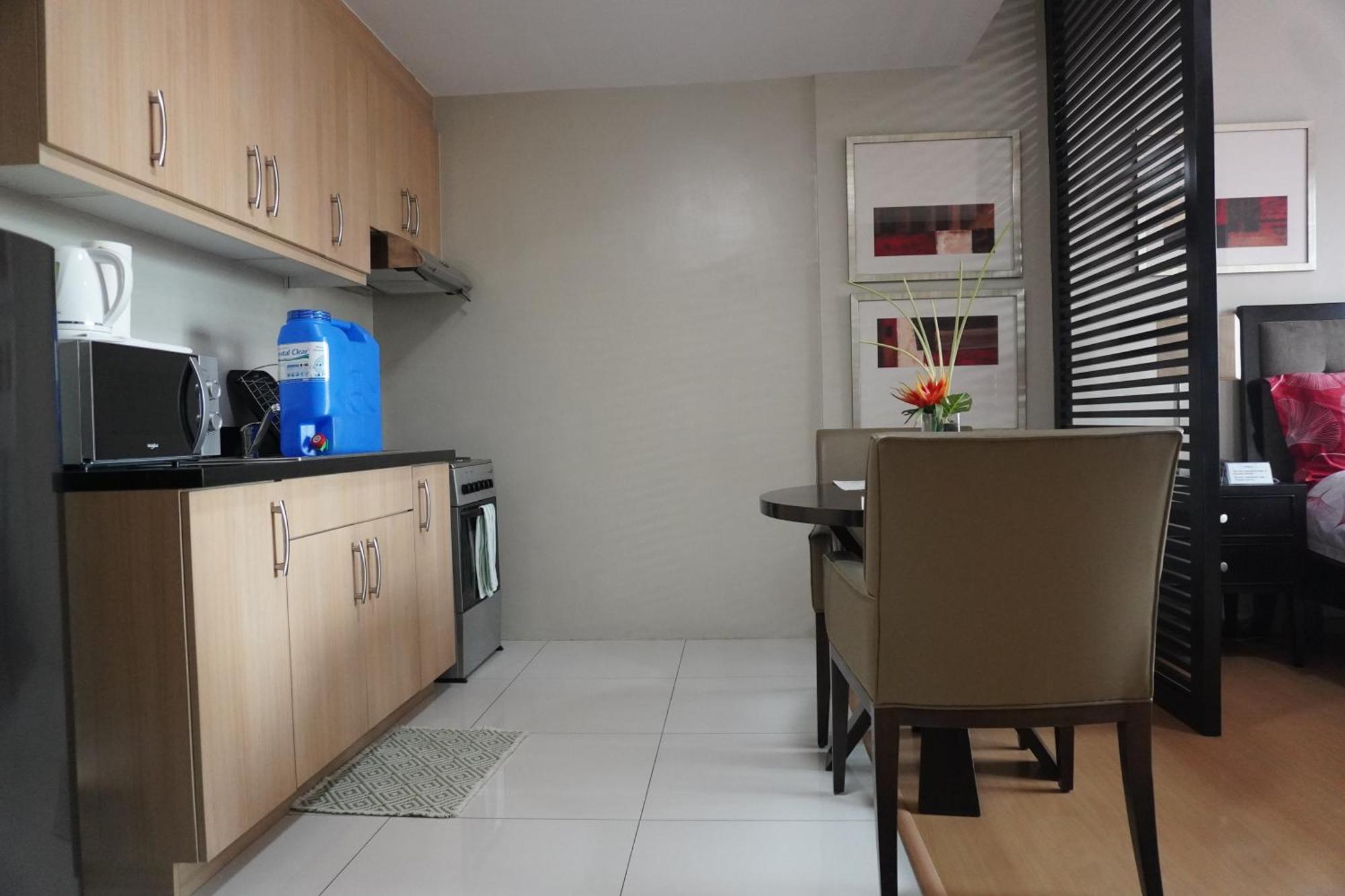 Avant Apartments At The Fort Тагиг Номер фото
